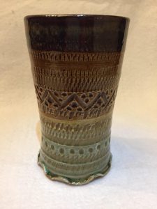Tall cup pottery with cool design