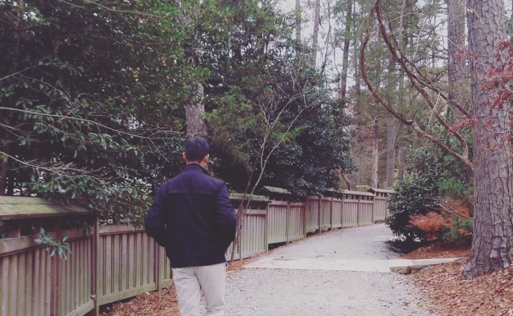 Aman walking in park